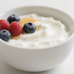 Greek Yogurt topped with honey and berries