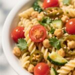 Chickpea Pasta Salad with cucumbers and tomatoes in vinaigrette