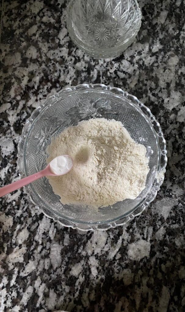 Mixing flour, baking soda, and salt for banana bread