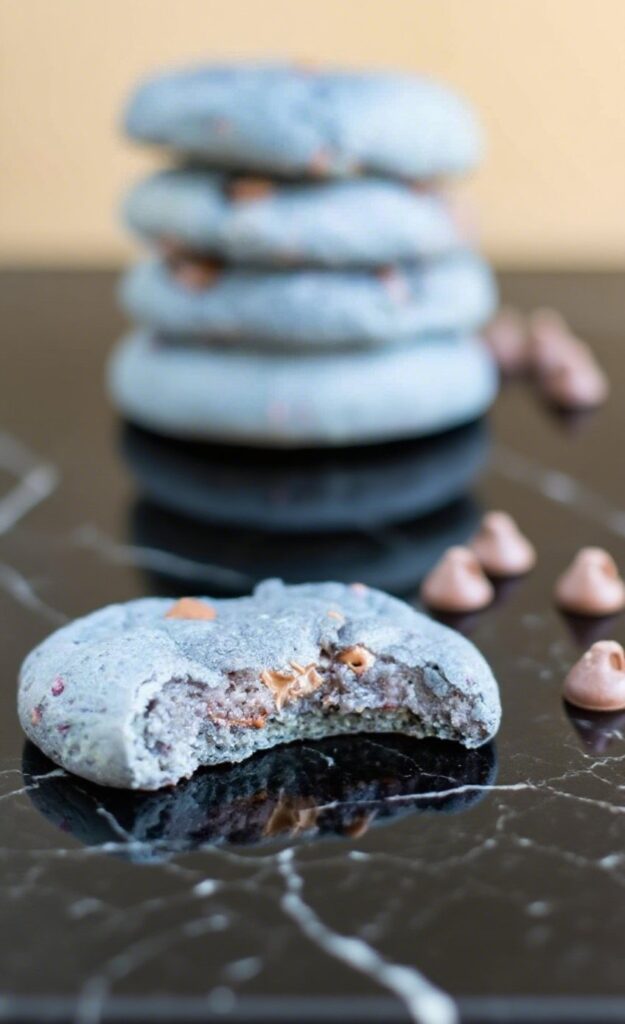 Freshly baked blackberry cookies with chocolate chips served on a plate