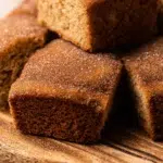 Apple Cider Donut Cake Slices on a Rustic Serving Plate