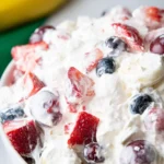 Colorful Cheesecake Fruit Salad in a Bowl