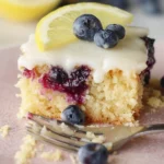 Lemon Blueberry Sheet Cake Slice on a White Plate